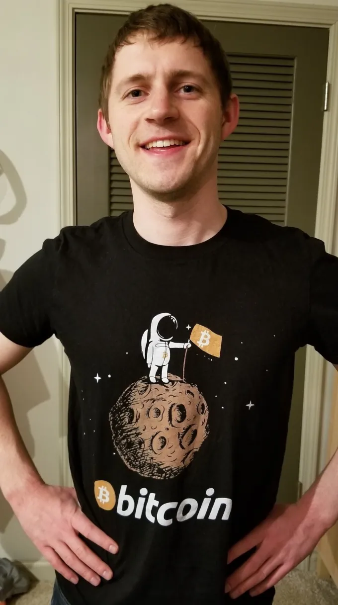 Thomas Hepner wearing a black Bitcoin T-shirt